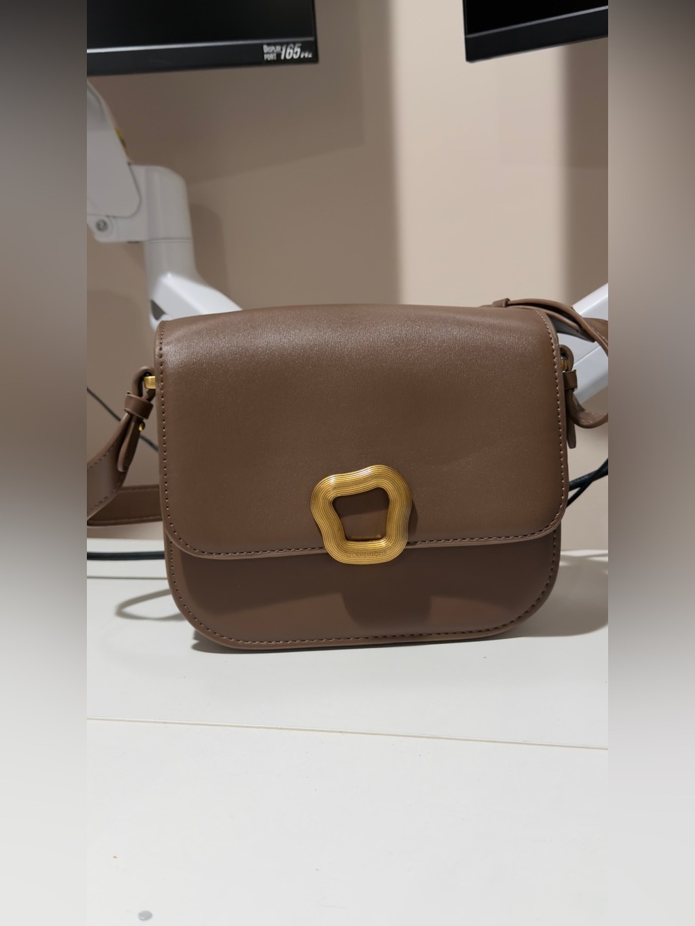 Songmont Taupe Crossbody Bag with Gold Accent